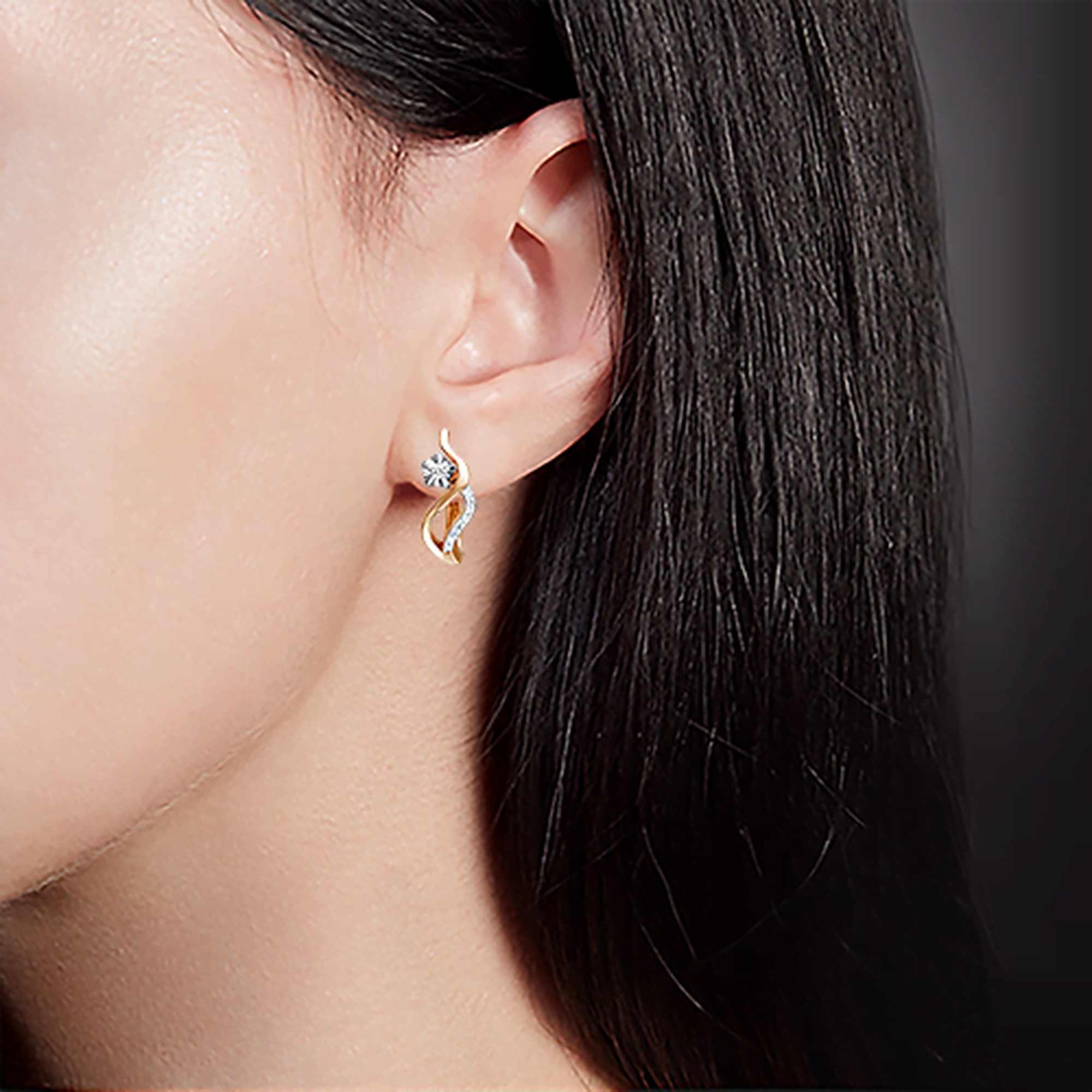 Серьги из комбинированного золота Platina с бриллиантом